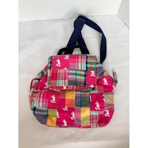 Colorful Disney Parks patchwork mini backpack with Mickey Mouse head silhouettes